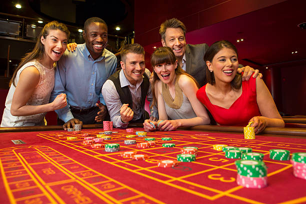 Live baccarat dealer dealing cards from shoe Live baccarat dealer dealing cards from shoe